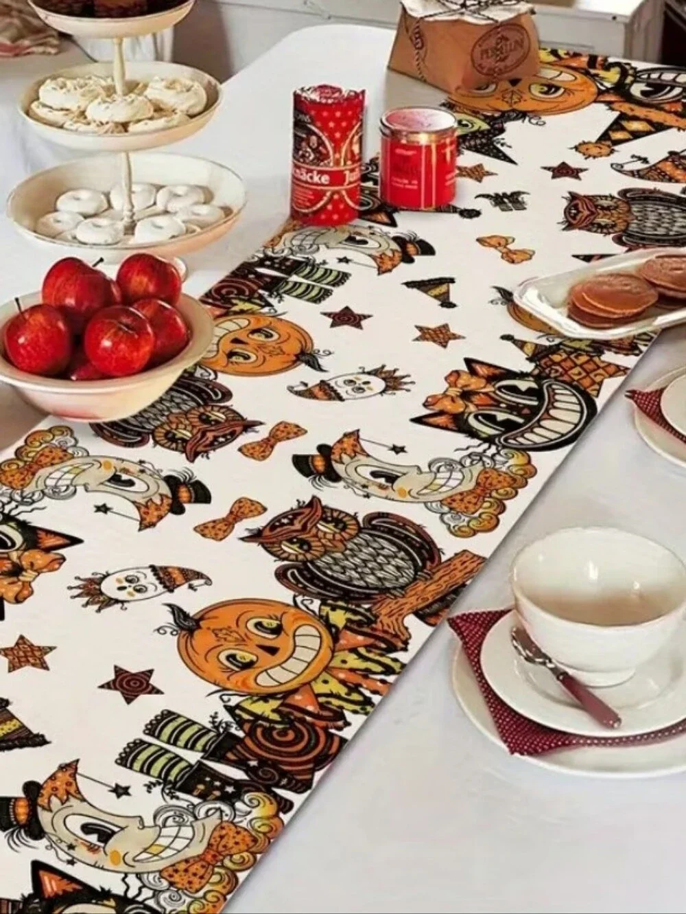 Festive Halloween table runner featuring playful pumpkin, owl and cat characters